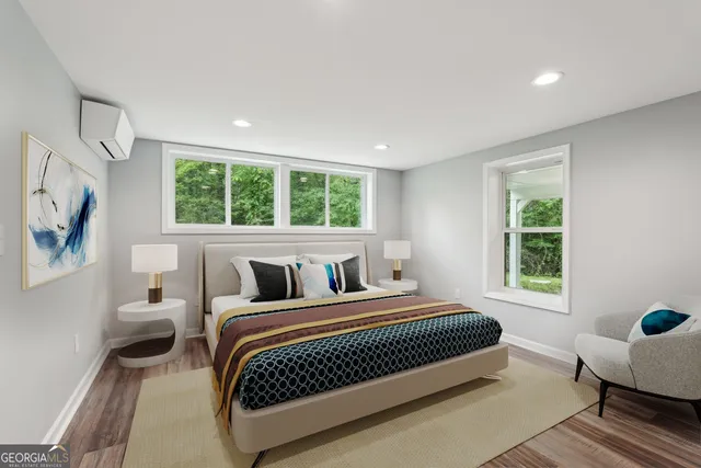 a view of a city with lush green forest