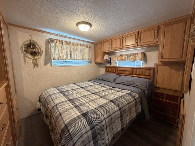 2795 East 28th Road Marseilles, IL 61341 - Photo 30 of 75 a bedroom with a bed and painting on the wall