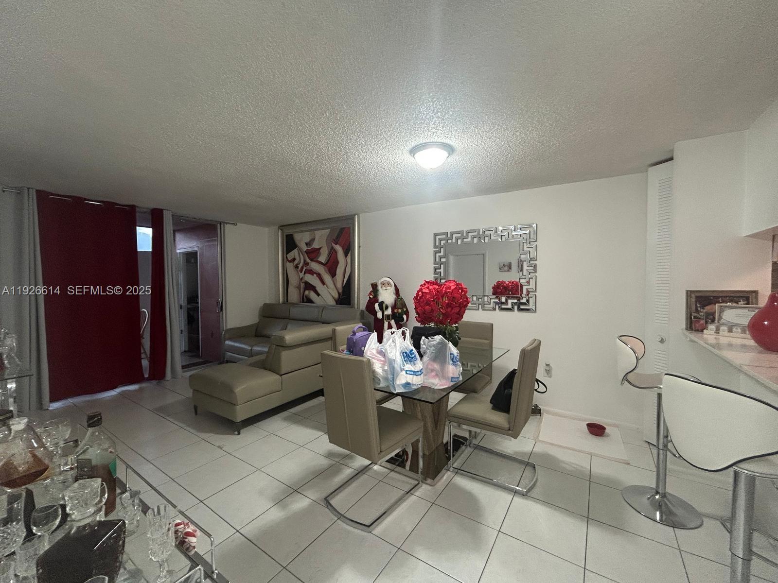 19771 Southwest 114th Avenue, Unit 329 Miami, FL 33157 - Photo 3 of 12 a workspace with furniture and window