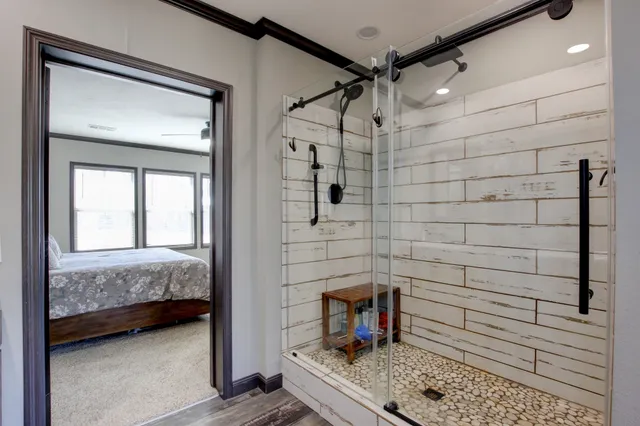 a bathroom with a sink and a shower