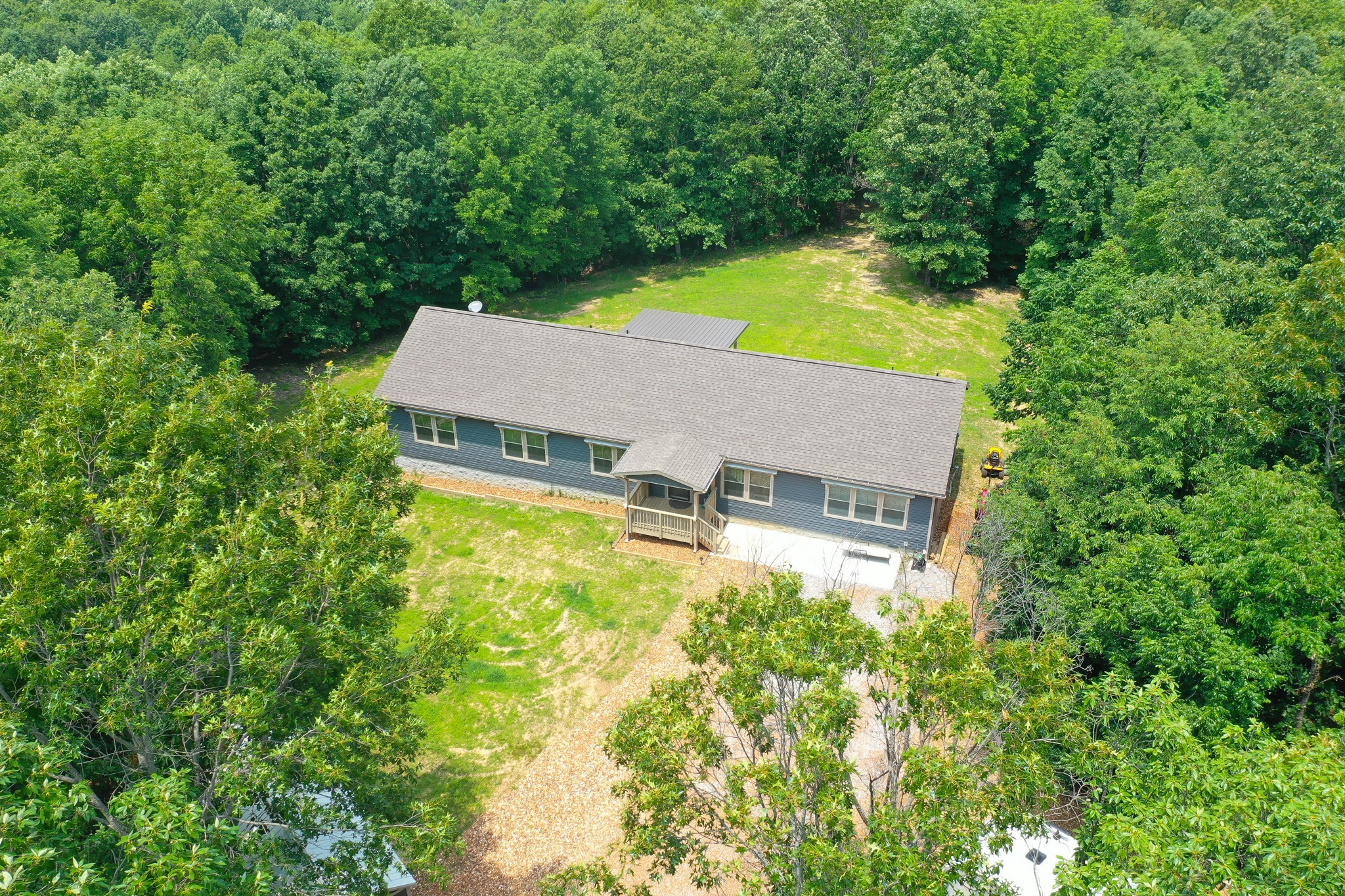 212 Skyline Ridge Dover, TN 37058 - Photo 2 of 41 an aerial view of a house with yard swimming pool and outdoor seating