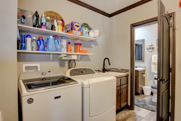a utility room with dryer and washer