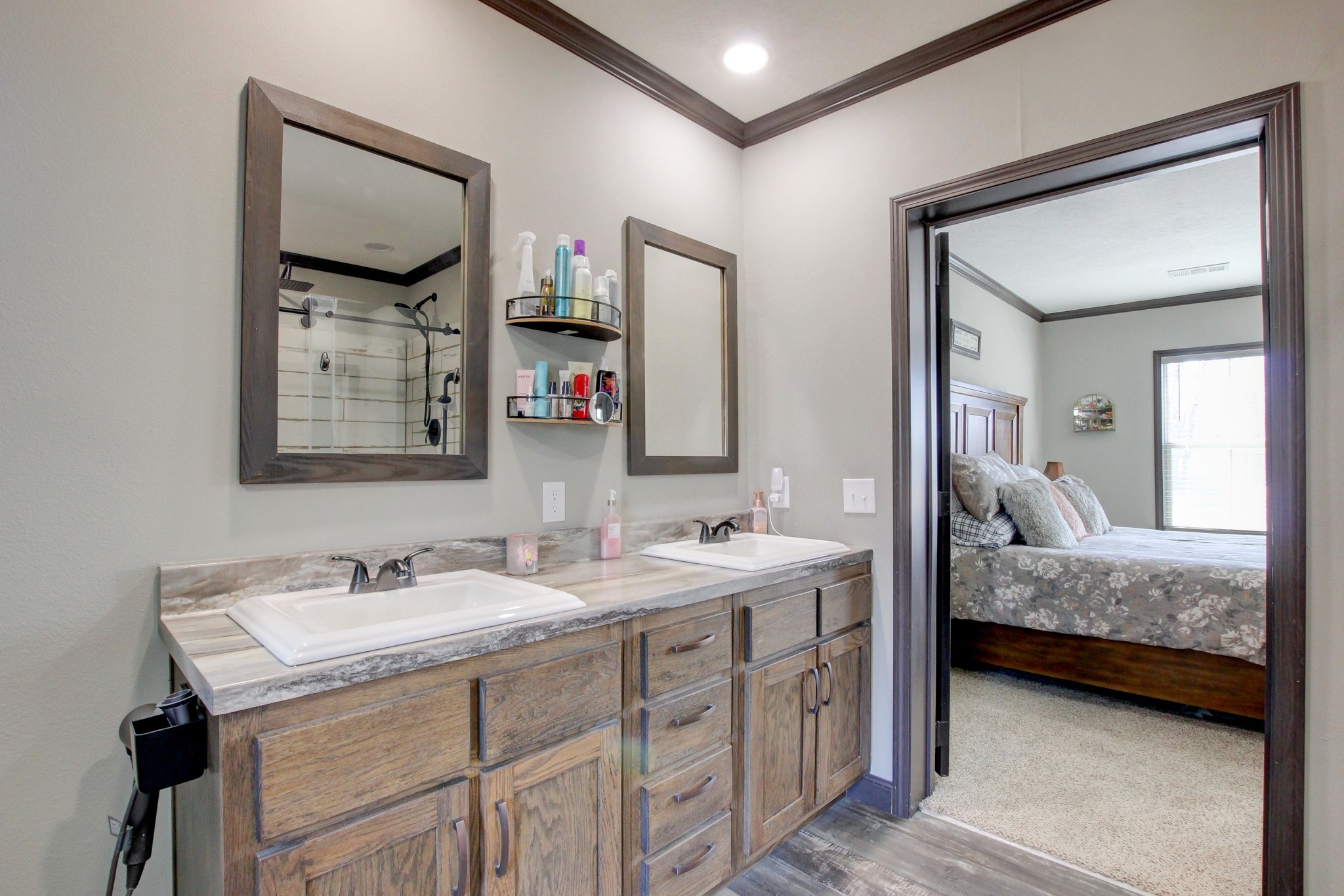 212 Skyline Ridge Dover, TN 37058 - Photo 23 of 41 a en suite bathroom with a double vanity sink and a mirror