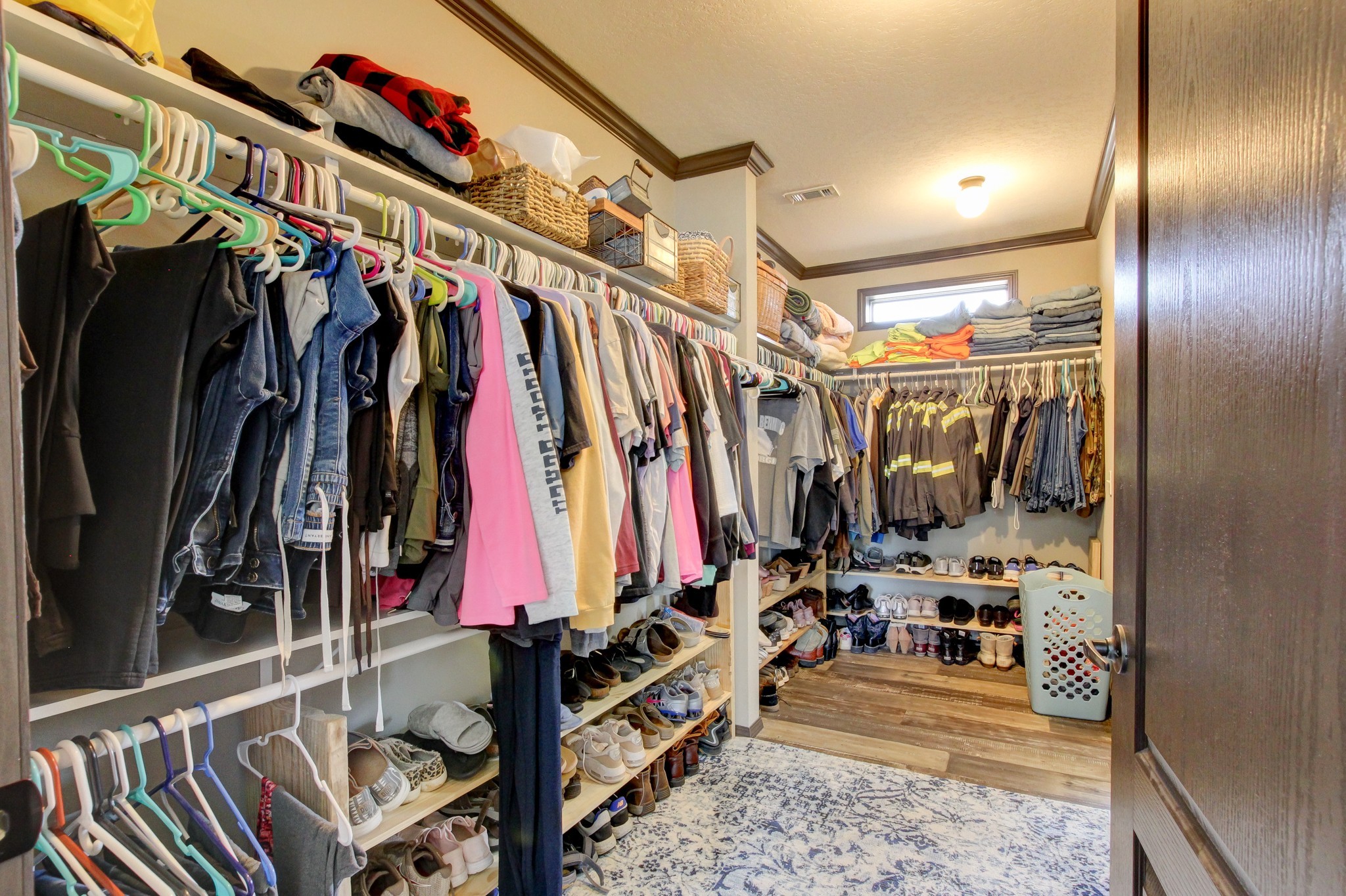 212 Skyline Ridge Dover, TN 37058 - Photo 27 of 41 a view of walk in closet with clothes and shoes