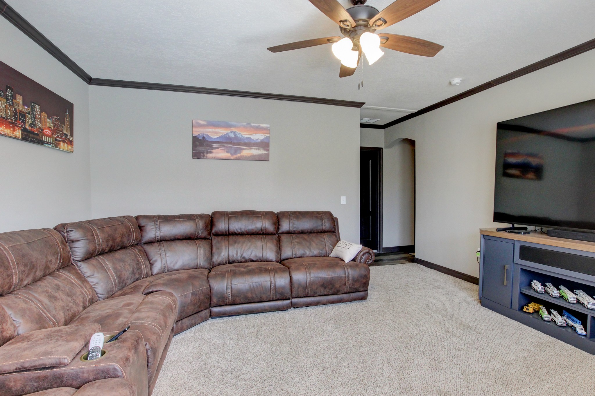 212 Skyline Ridge Dover, TN 37058 - Photo 37 of 41 a living room with furniture and a flat screen tv