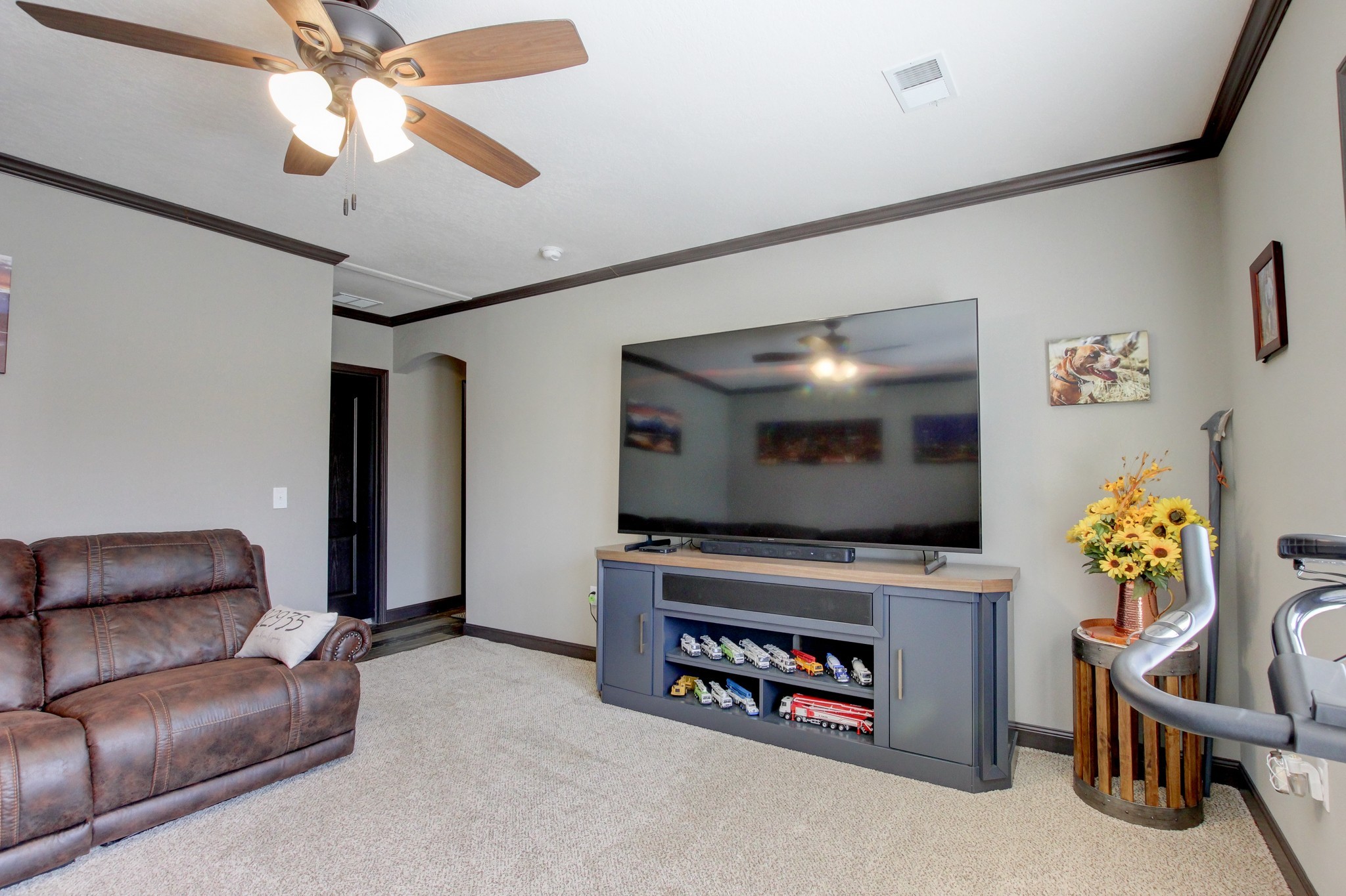 212 Skyline Ridge Dover, TN 37058 - Photo 38 of 41 a living room with furniture and a flat screen tv
