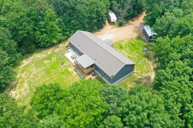 view of a house with a yard