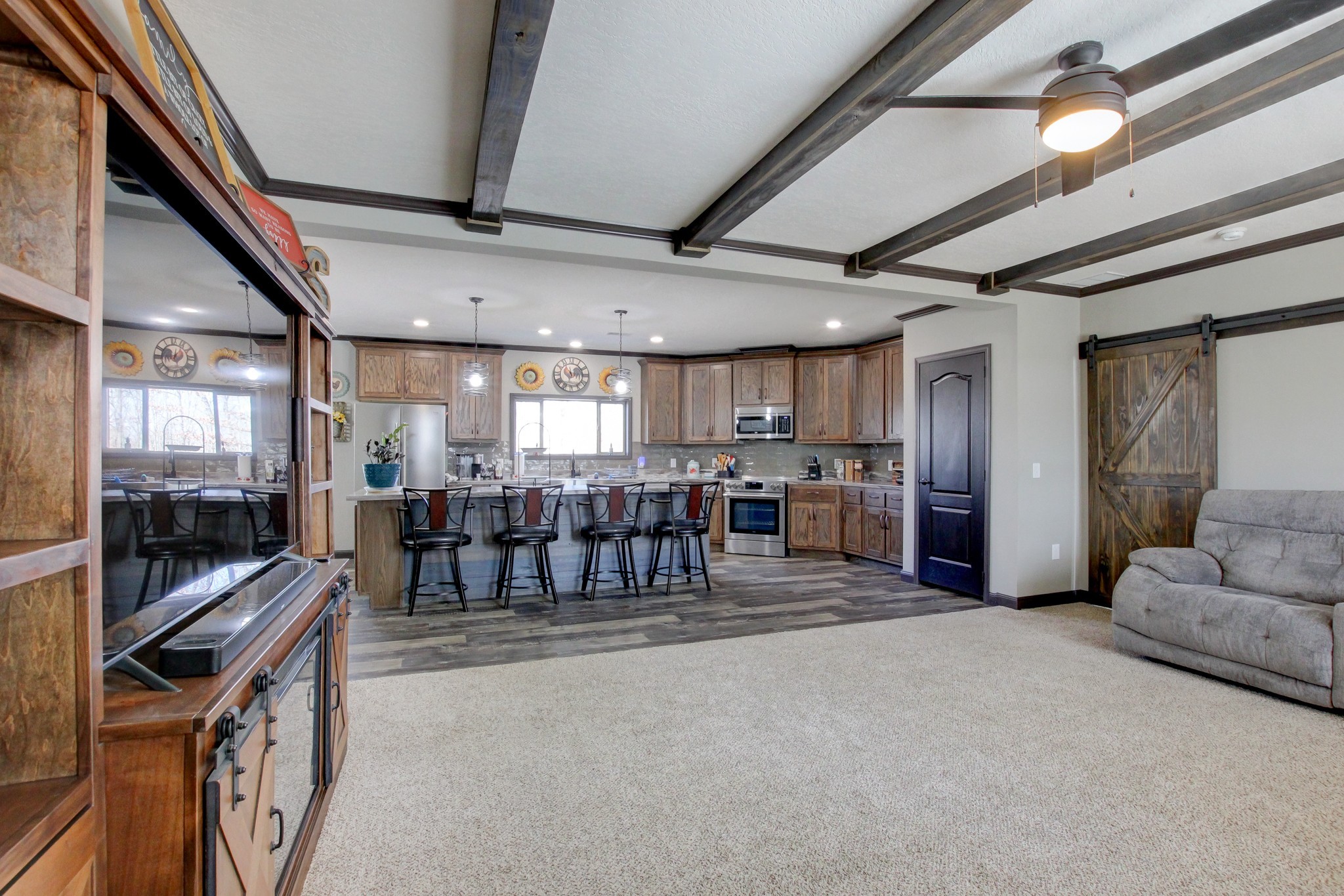 212 Skyline Ridge Dover, TN 37058 - Photo 4 of 41 a living room with furniture and a ceiling fan