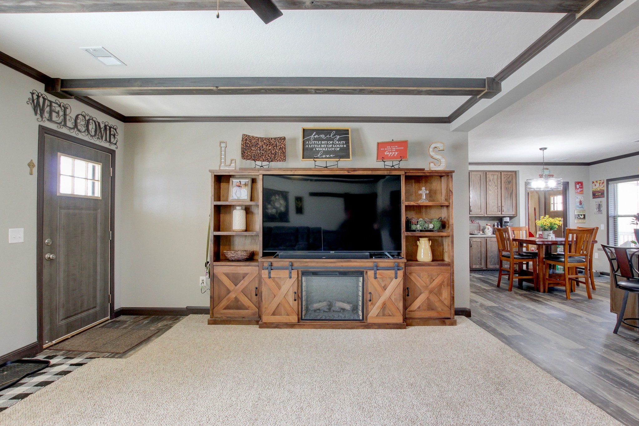 212 Skyline Ridge Dover, TN 37058 - Photo 6 of 41 a living room with furniture and a flat screen tv
