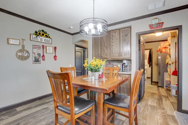 a view of a dining room with furniture