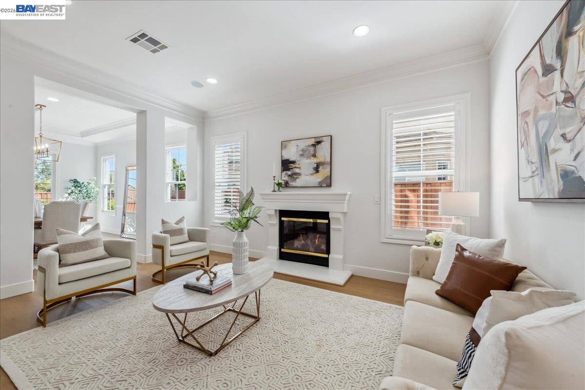 2890 Sable Oaks Way Dublin, CA 94568 - Photo 15 of 60 a living room with furniture and a fireplace