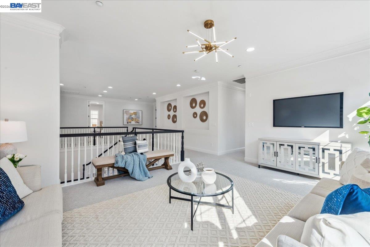 2890 Sable Oaks Way Dublin, CA 94568 - Photo 25 of 60 a living room with furniture and a flat screen tv