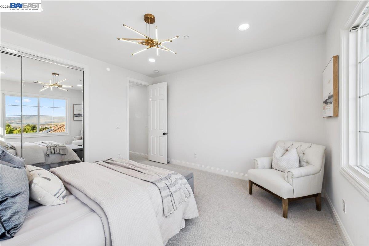 2890 Sable Oaks Way Dublin, CA 94568 - Photo 35 of 60 a bedroom with a bed and ceiling fan