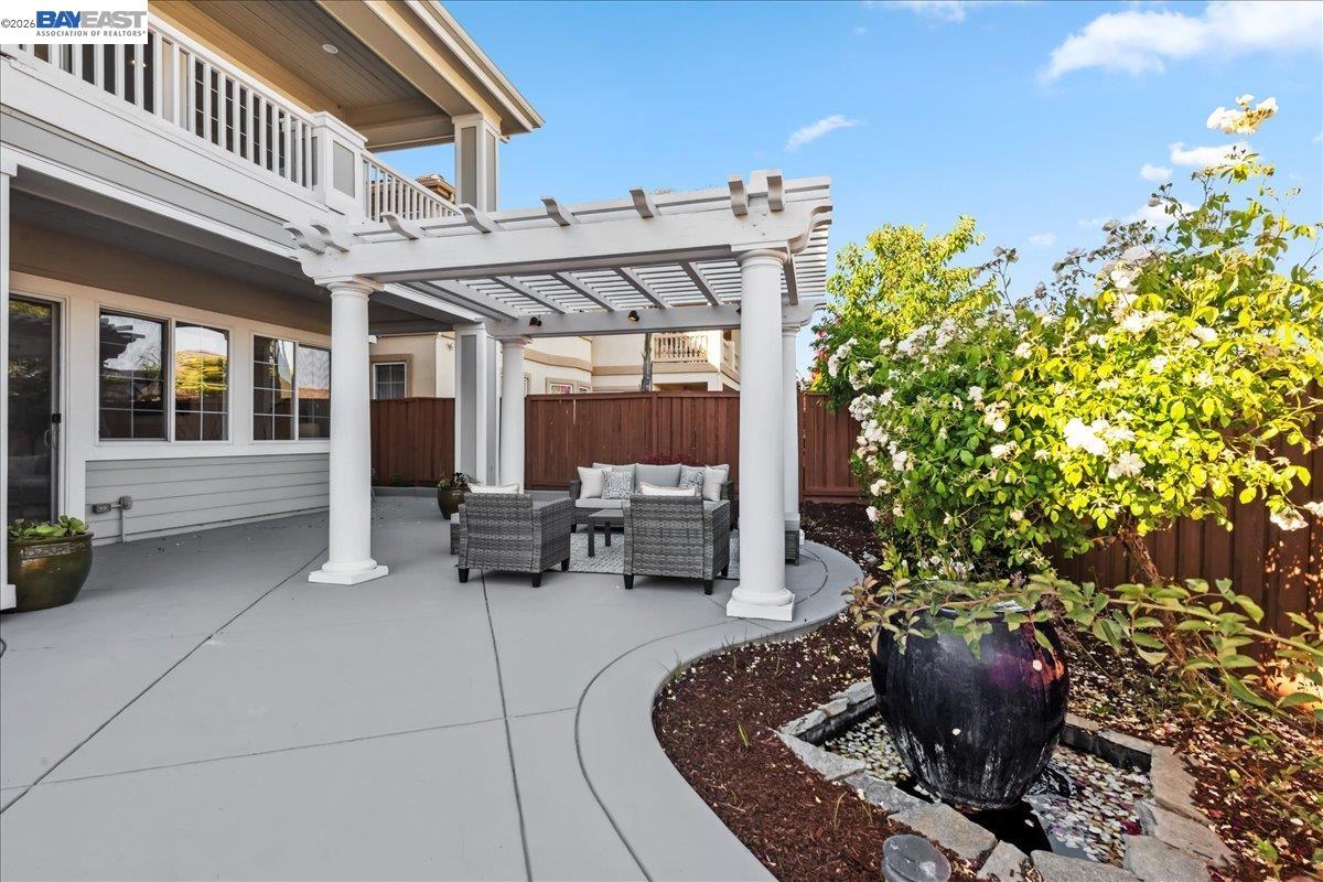 2890 Sable Oaks Way Dublin, CA 94568 - Photo 51 of 60 a view of a patio with table and chairs potted plants