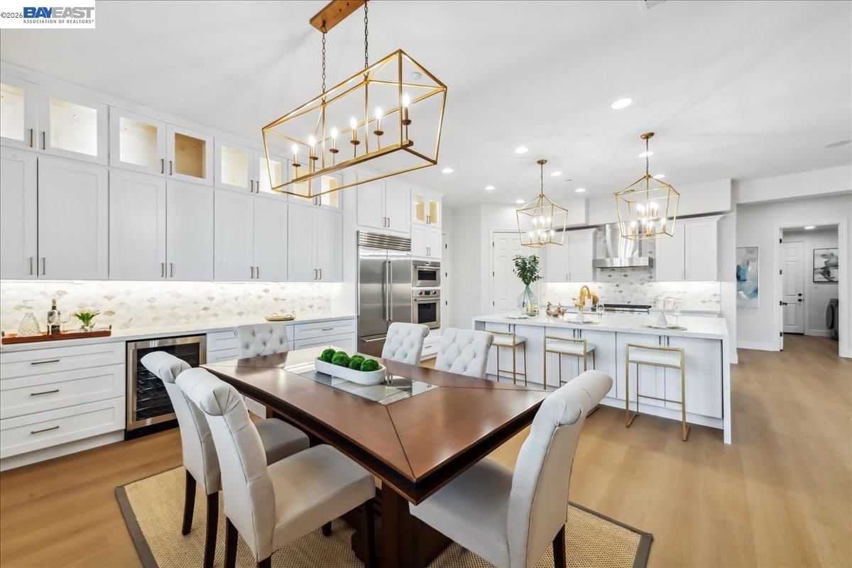 2890 Sable Oaks Way Dublin, CA 94568 - Photo 6 of 60 a view of a dining room with furniture and wooden floor