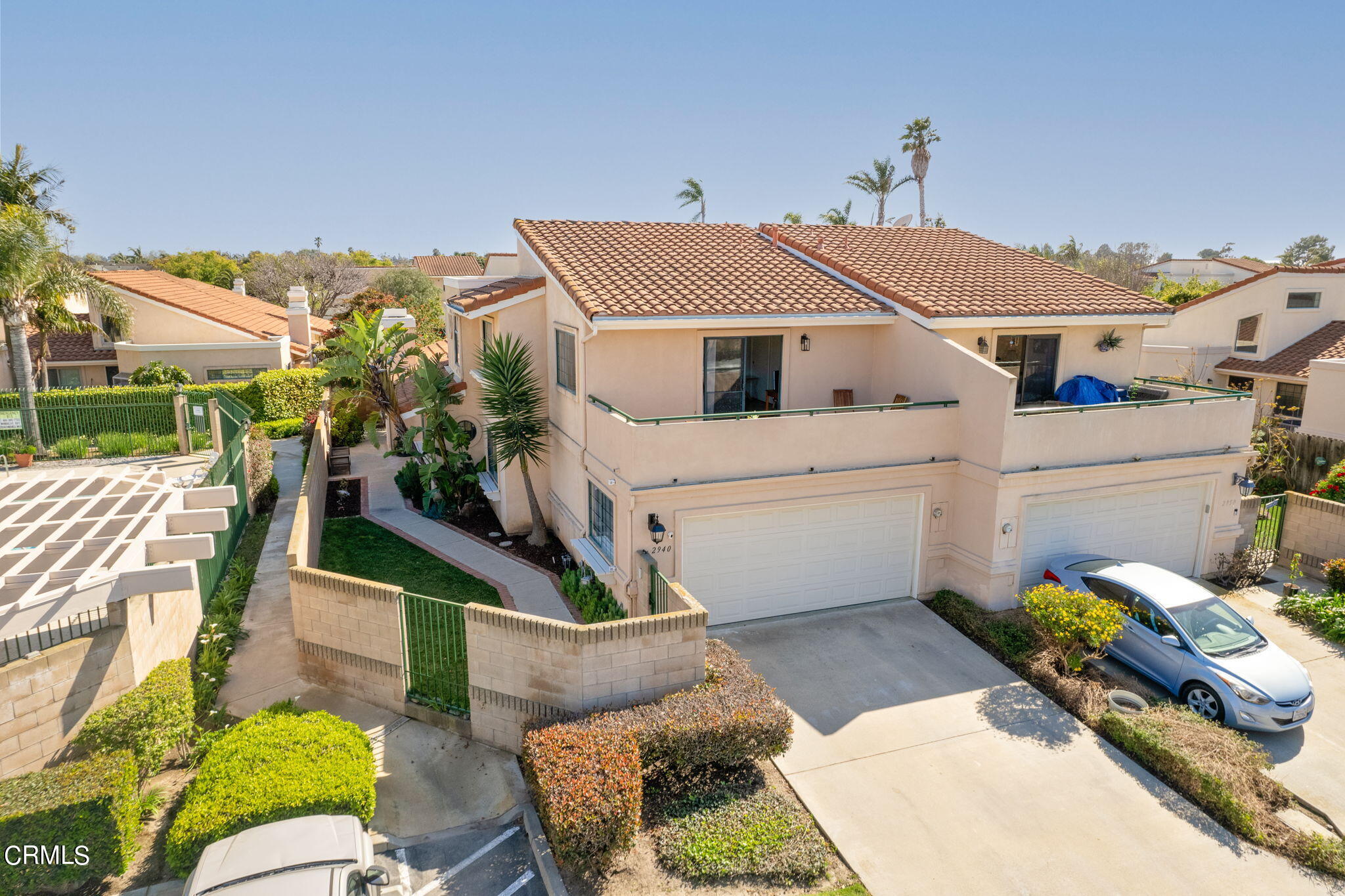 2940 Fanshell Walk Oxnard, CA 93035 - Photo 1 of 40 a white building with a outdoor space