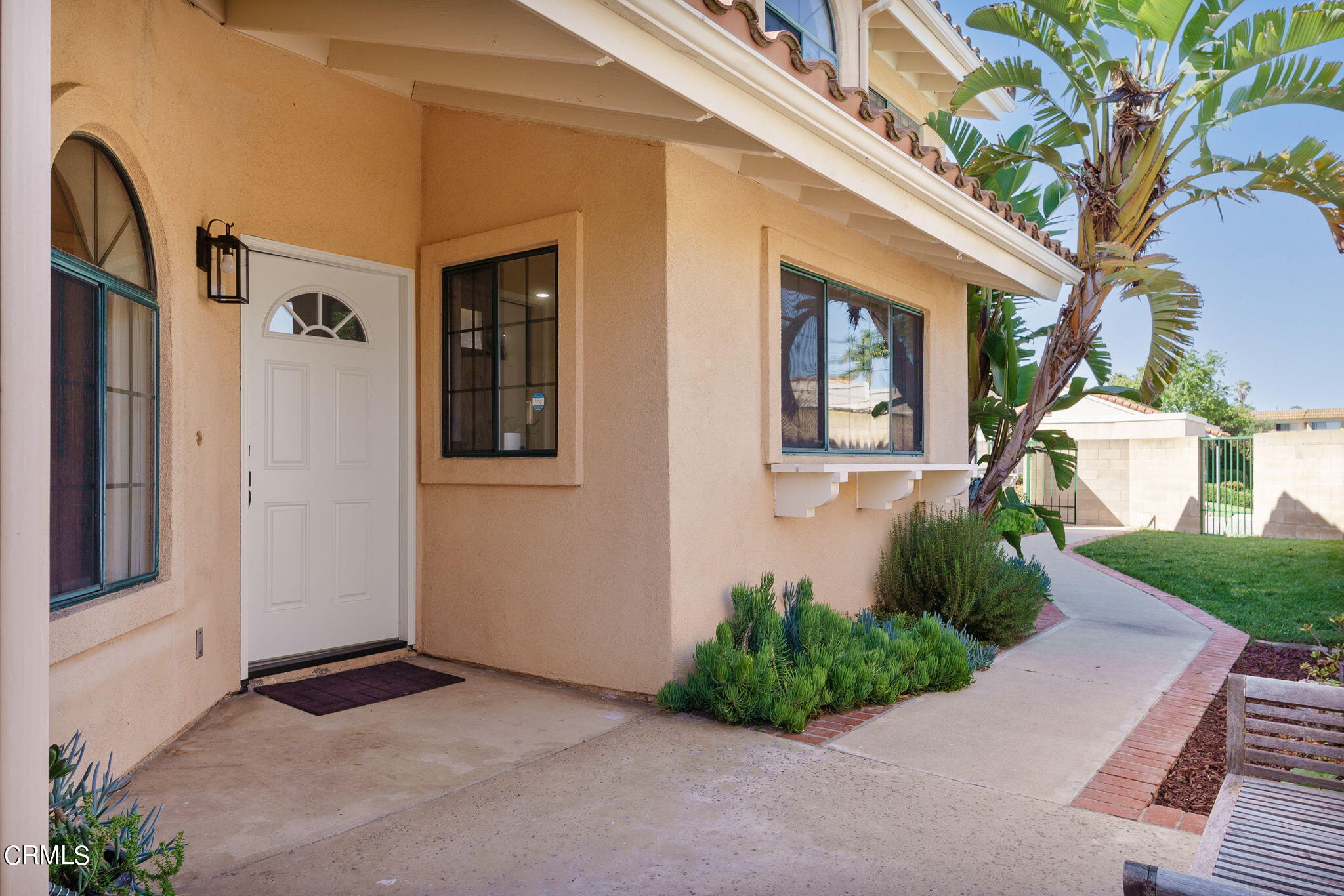 2940 Fanshell Walk Oxnard, CA 93035 - Photo 13 of 40 a front view of a house with garden