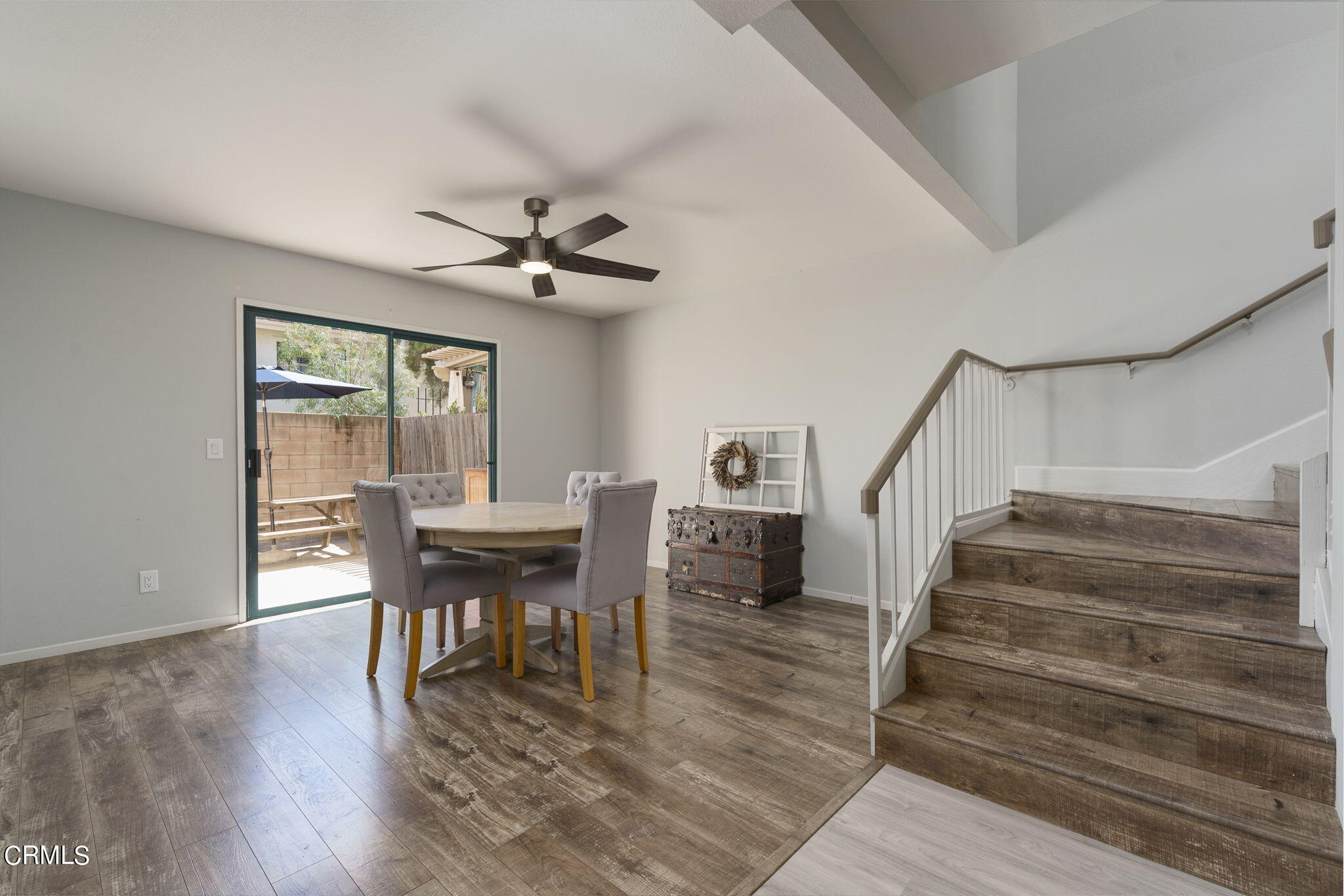 2940 Fanshell Walk Oxnard, CA 93035 - Photo 20 of 40 a view of a dining room with furniture window and wooden floor