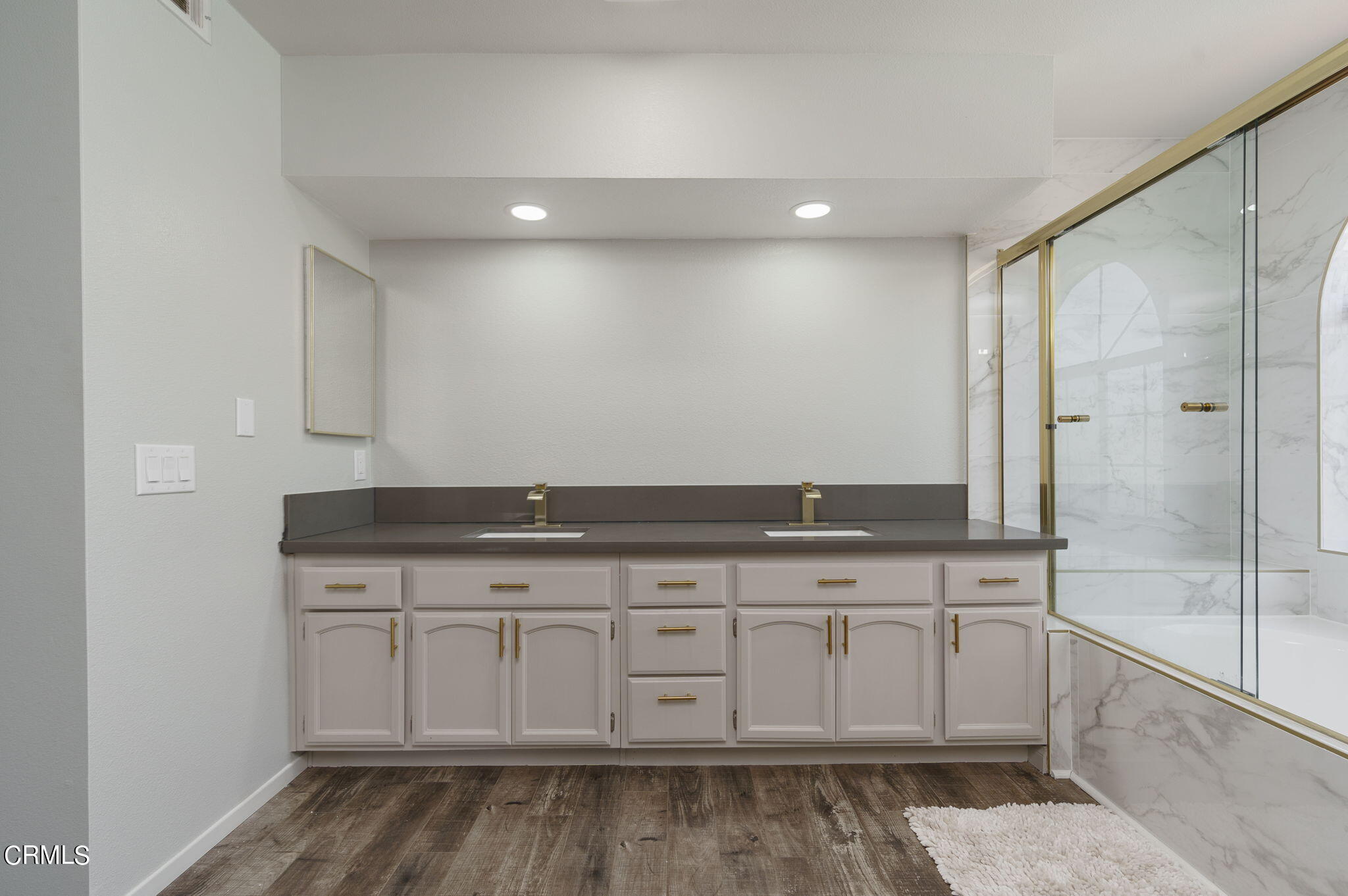 2940 Fanshell Walk Oxnard, CA 93035 - Photo 26 of 40 a view of cabinets with wooden floor