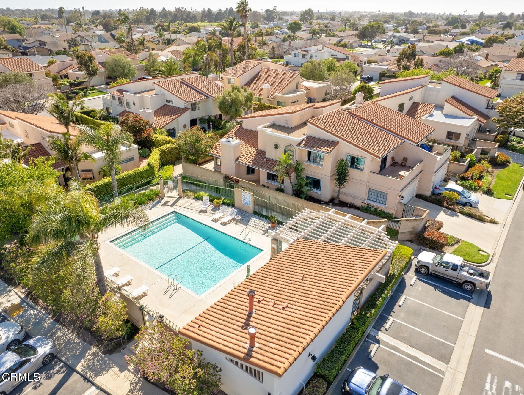 2940 Fanshell Walk Oxnard, CA 93035 - Photo 40 of 40 an aerial view of a residential apartment building with a yard