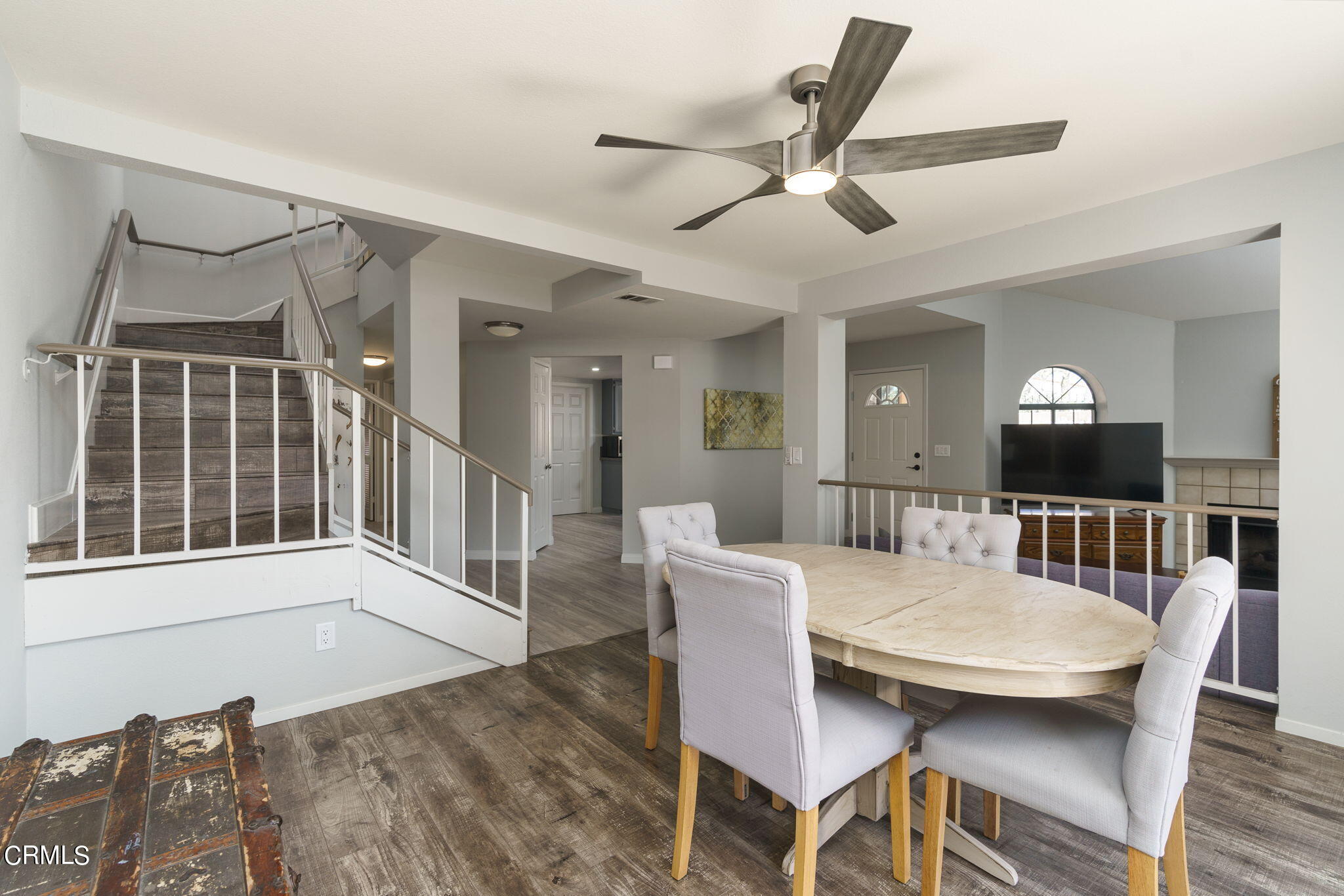 2940 Fanshell Walk Oxnard, CA 93035 - Photo 4 of 40 a dining room with furniture a rug and wooden floor