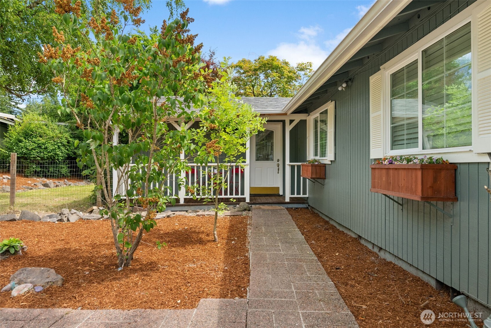 11810 County Line Road East Edgewood, WA 98372 - Photo 27 of 38 a view of a house with backyard and deck
