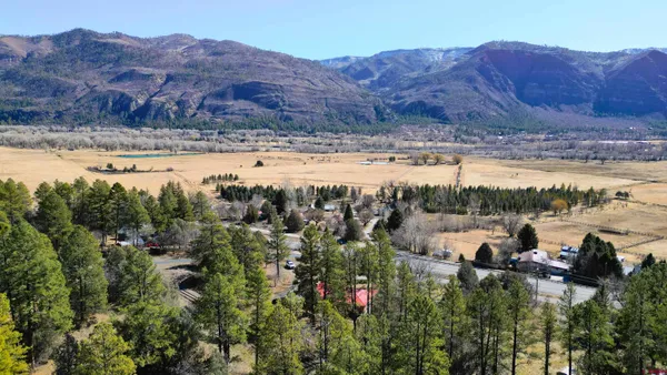 a view of a large body of water and a mountain