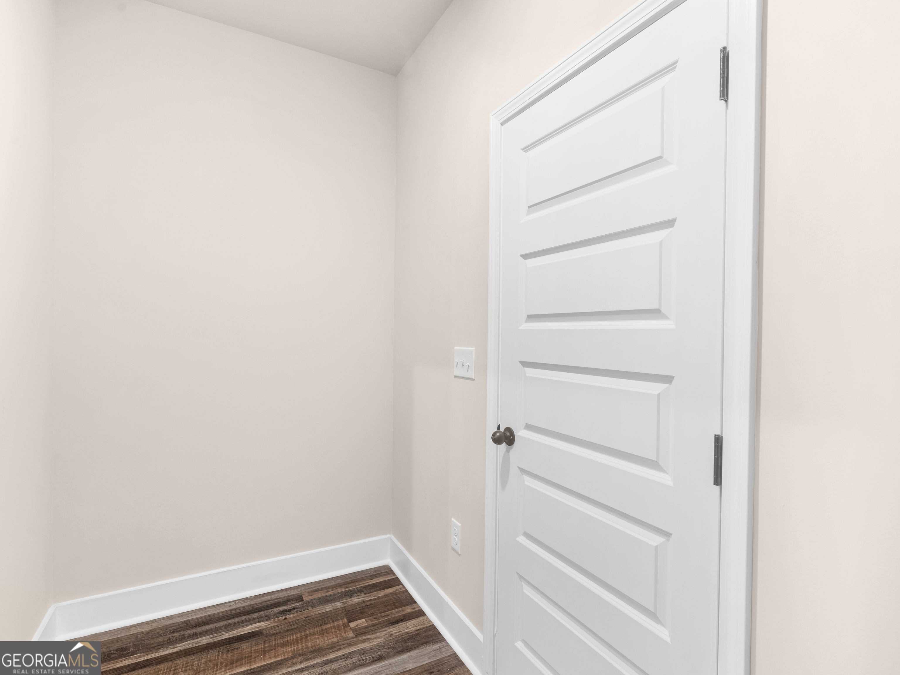 160 Loyd Road Mansfield, GA 30056 - Photo 29 of 53 a view of walk in closet with empty racks