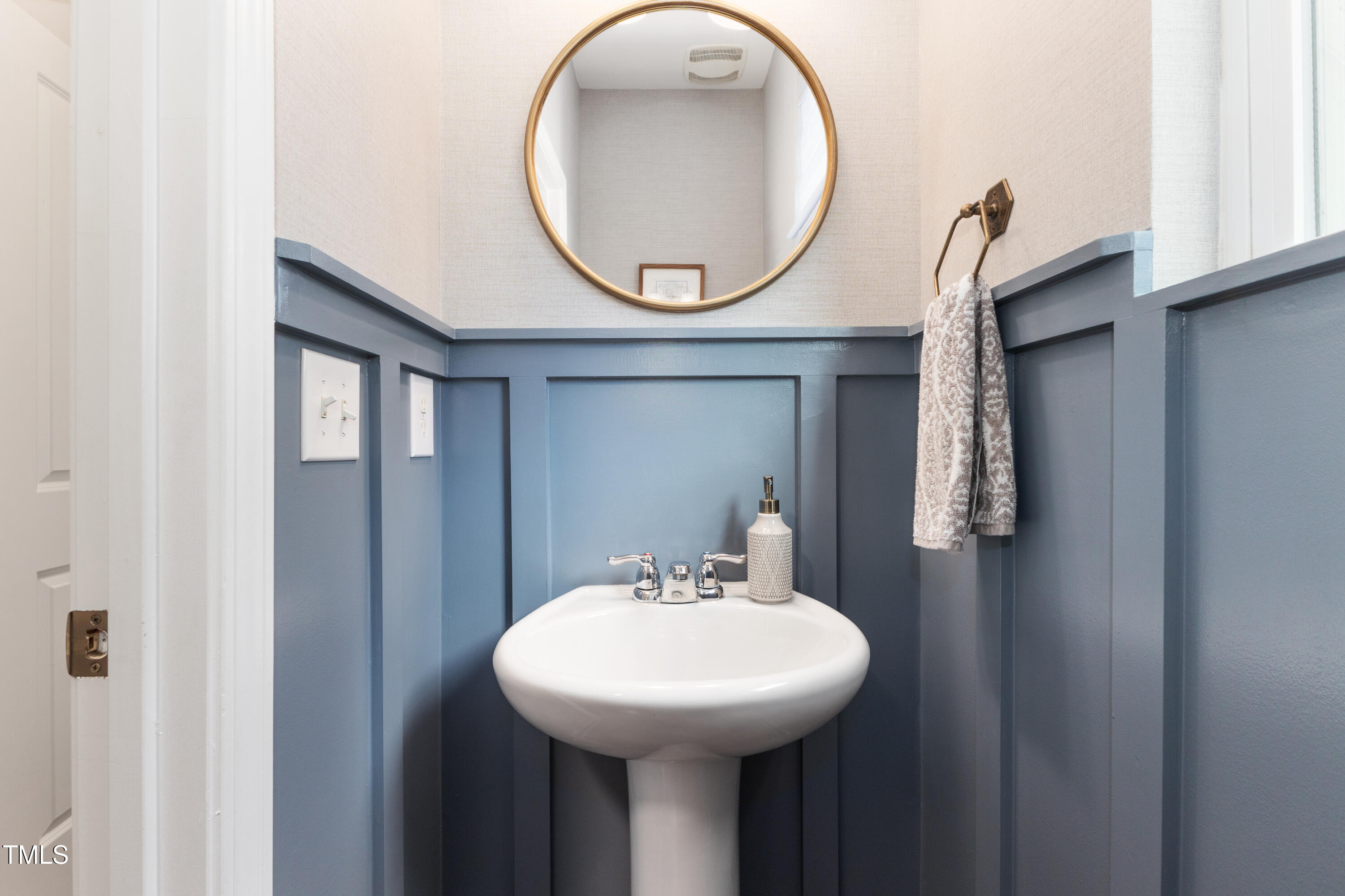 617 Hope Valley Road Knightdale, NC 27545 - Photo 15 of 42 a bathroom with a sink and a mirror