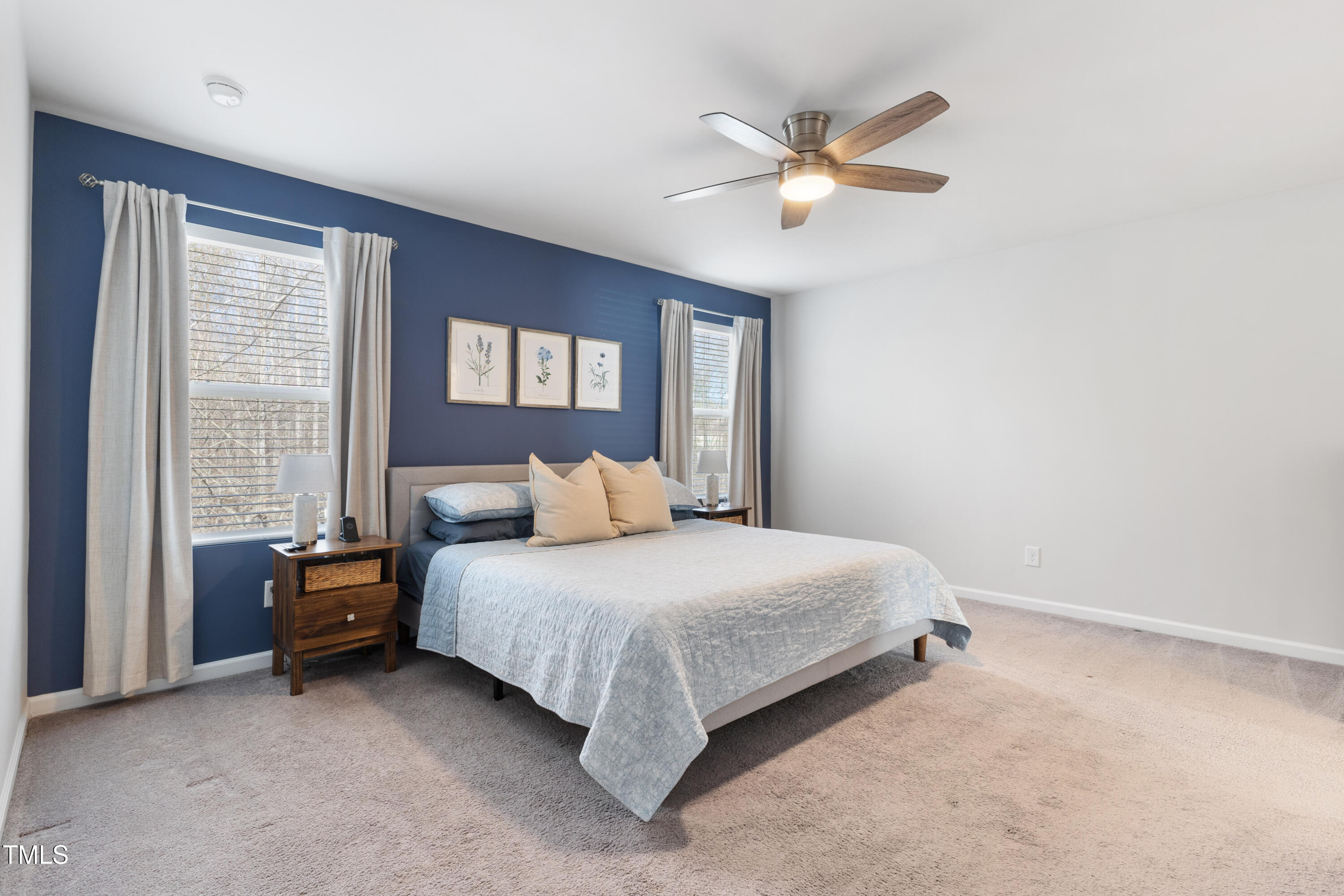 617 Hope Valley Road Knightdale, NC 27545 - Photo 16 of 42 a bedroom with a bed and window