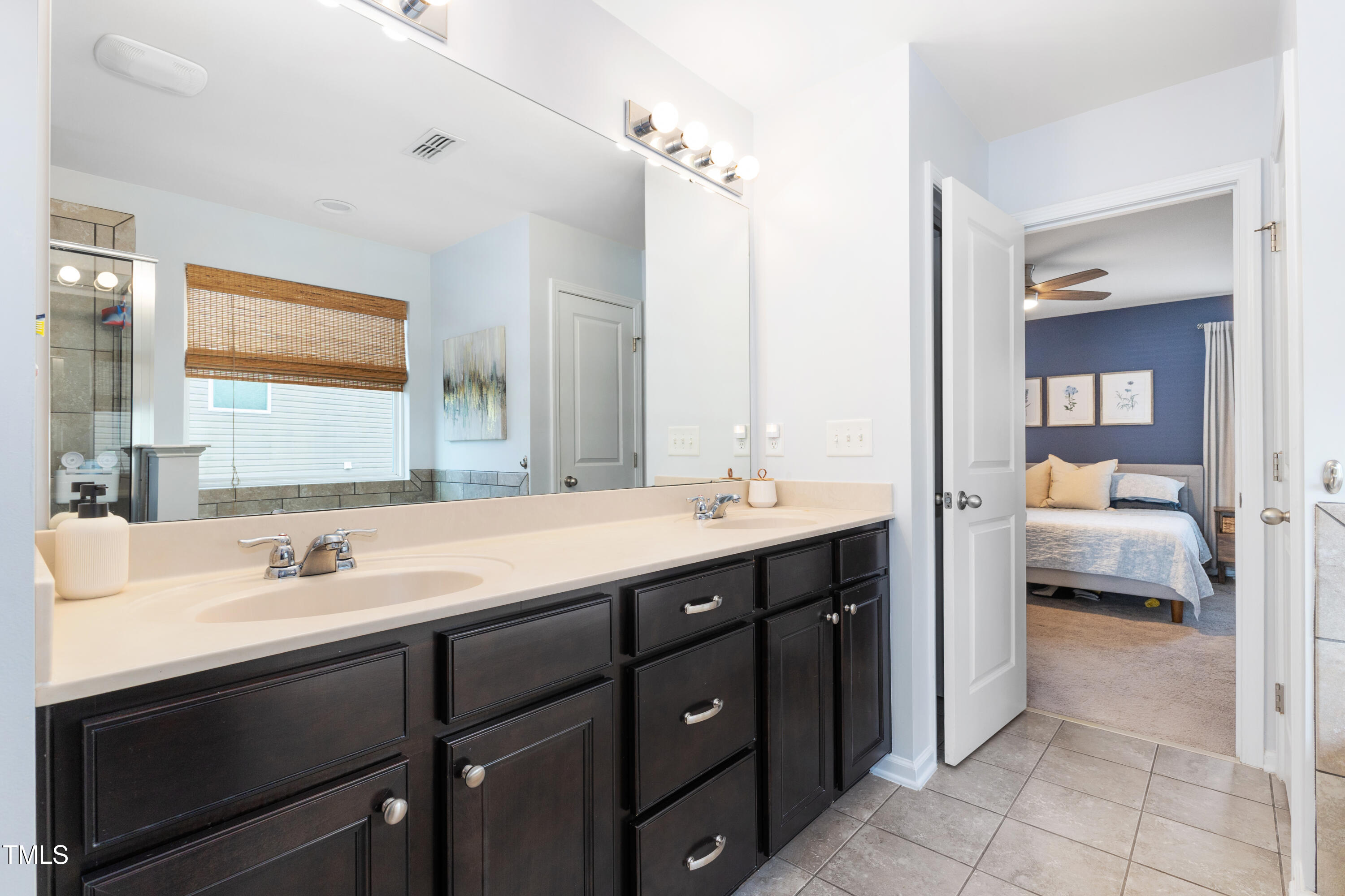 617 Hope Valley Road Knightdale, NC 27545 - Photo 18 of 42 a en suite bathroom with a sink and a mirror