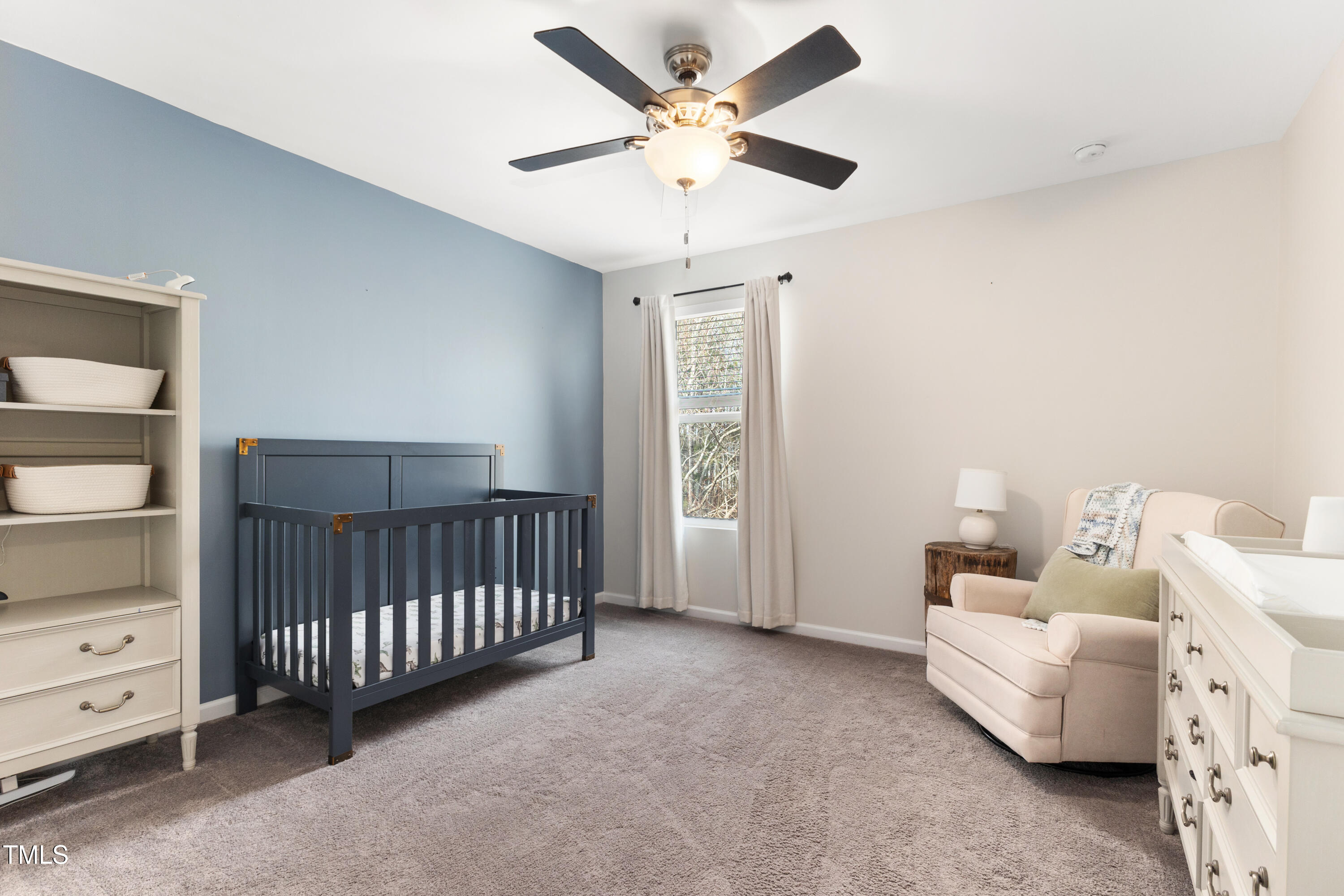 617 Hope Valley Road Knightdale, NC 27545 - Photo 20 of 42 a living room with furniture and a chandelier