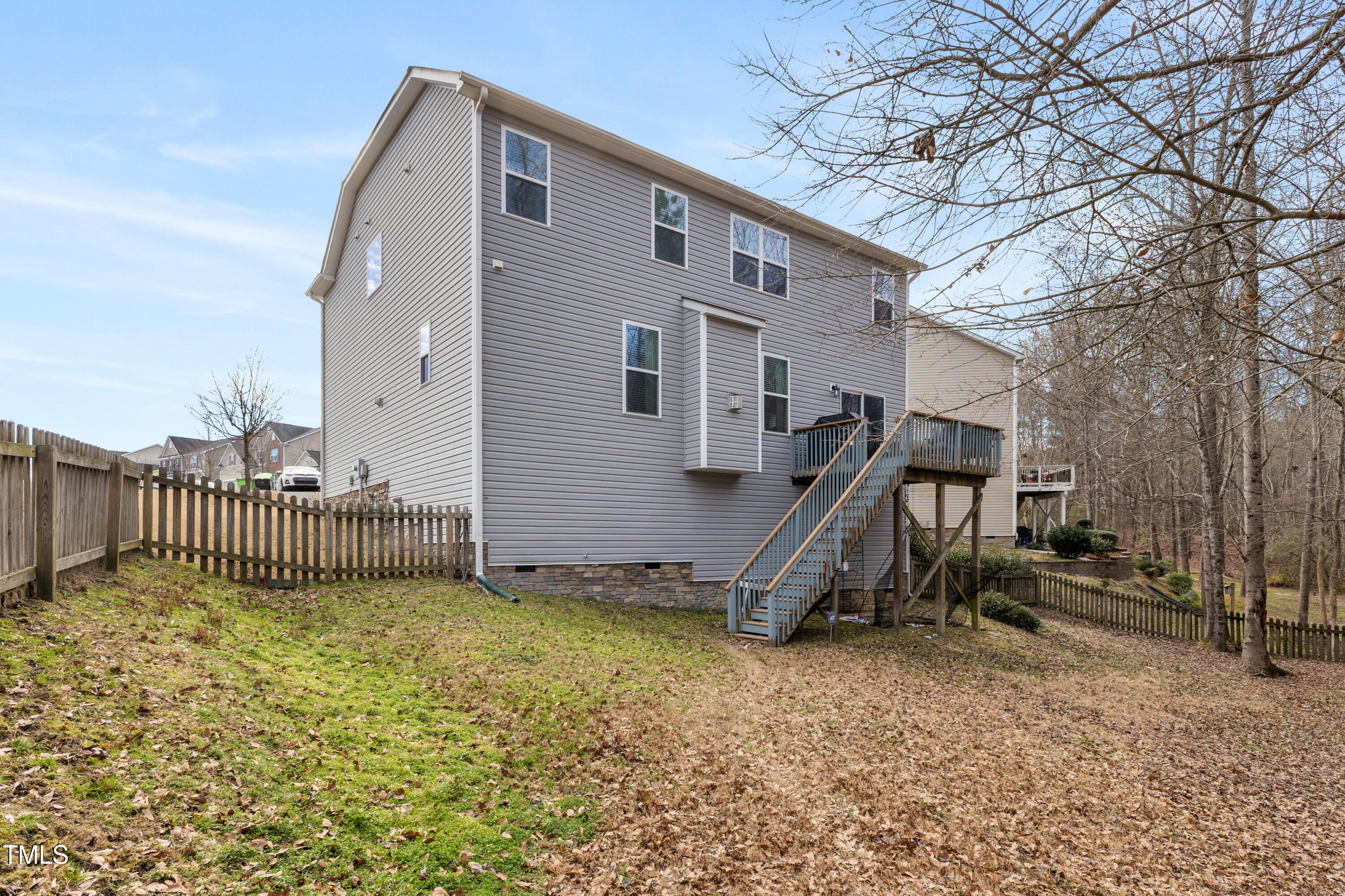 617 Hope Valley Road Knightdale, NC 27545 - Photo 32 of 42 a view of a house with a wooden fence