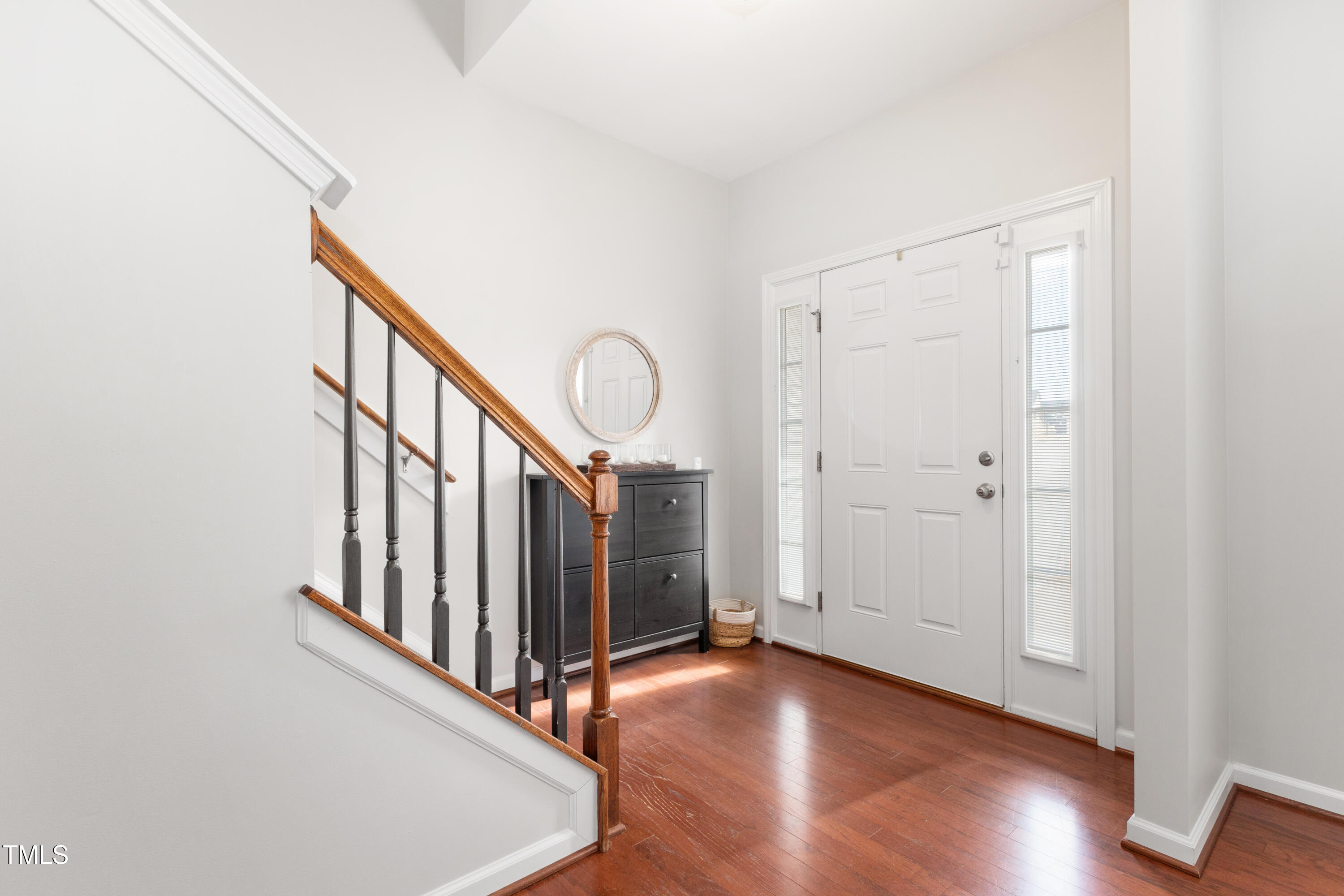 617 Hope Valley Road Knightdale, NC 27545 - Photo 4 of 42 a view of a hallway with wooden floor and entryway