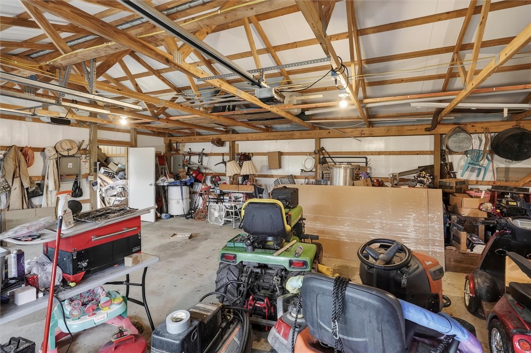 1926 Fairview Road Peebles, OH 45660 - Photo 42 of 44 This spacious garage offers ample storage and utility for various needs.