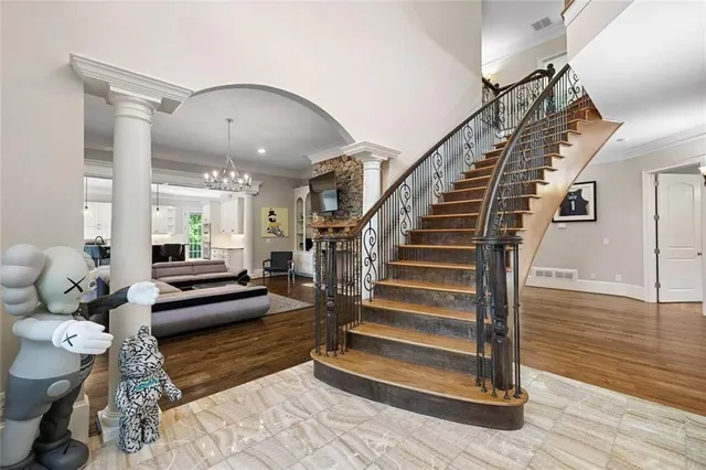 a kitchen with stainless steel appliances granite countertop a sink and a stove