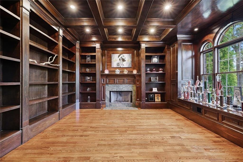 11140 W Road Roswell, GA 30075 - Photo 22 of 72 a view of an empty room with a window and a fireplace