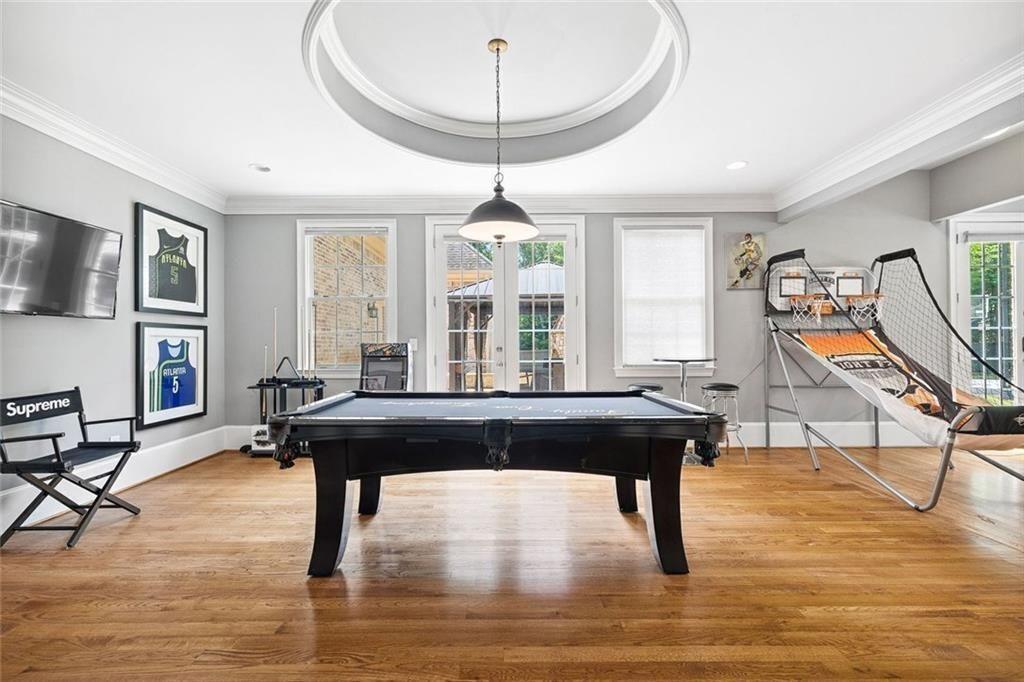 11140 W Road Roswell, GA 30075 - Photo 23 of 72 a living room with furniture a piano and a large window