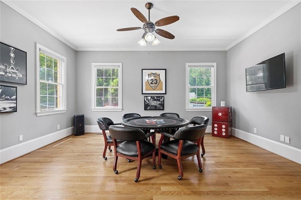 11140 W Road Roswell, GA 30075 - Photo 24 of 72 a view of a dining room with furniture window and wooden floor