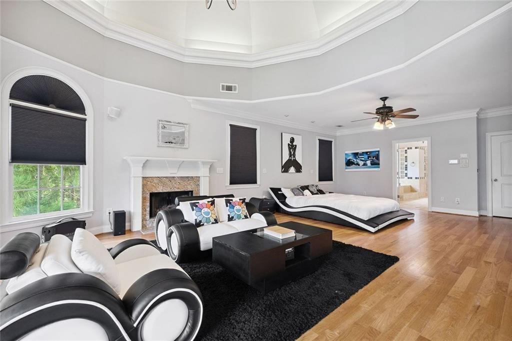 11140 W Road Roswell, GA 30075 - Photo 32 of 72 a living room with furniture fireplace and window