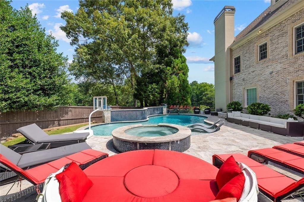11140 W Road Roswell, GA 30075 - Photo 61 of 72 a view of swimming pool with outdoor seating and yard