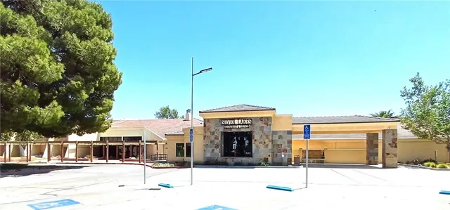 a front view of a building with street