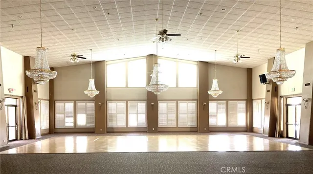 a view of a bathroom with a large window and tub