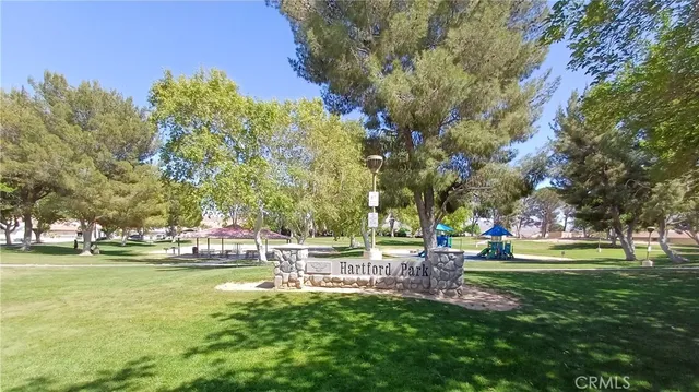 a garden view with a fountain