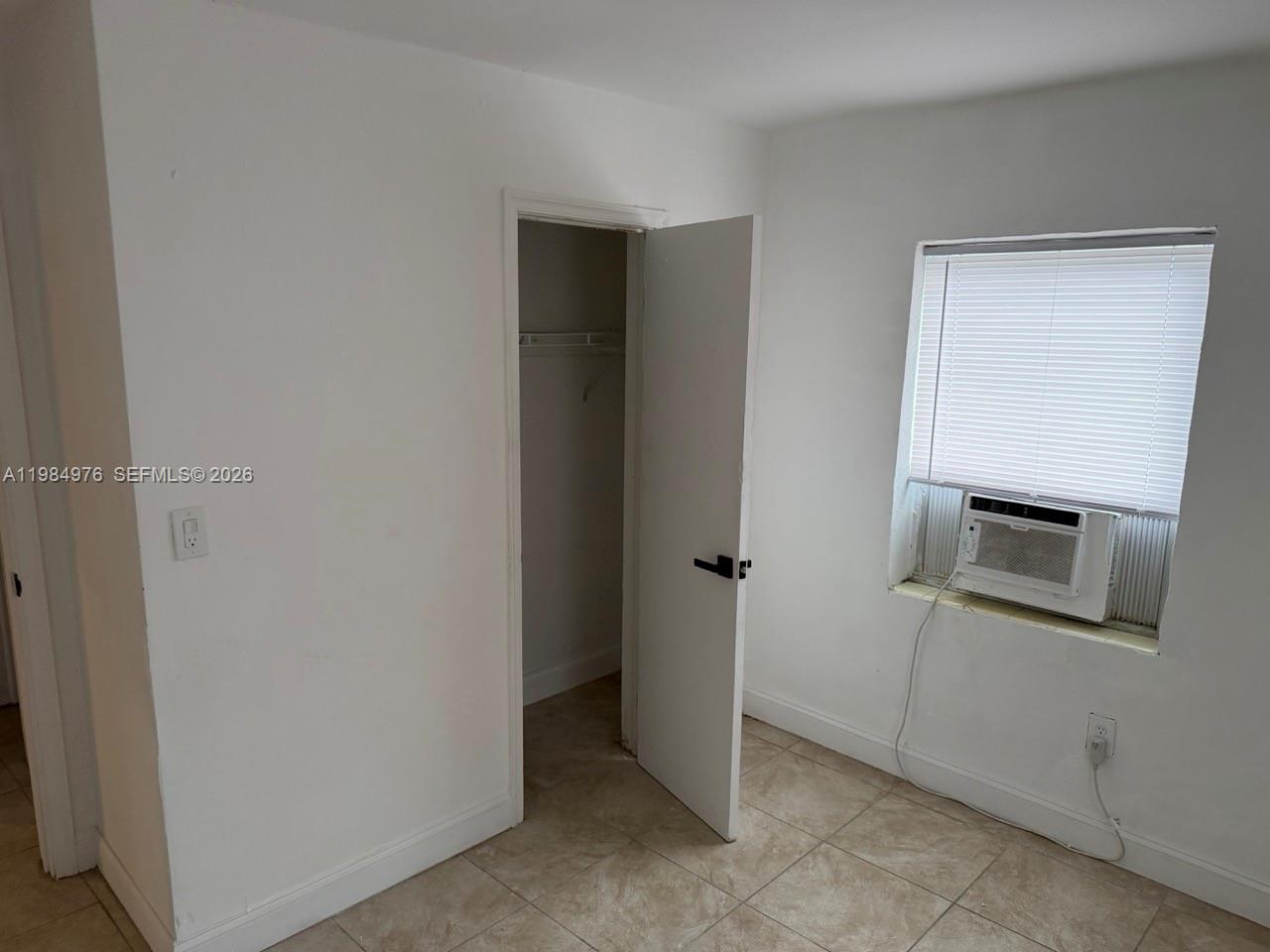 2335 Northwest 68th Street, Unit 1 Miami, FL 33147 - Photo 10 of 12 a view of a storage and utility room in a room