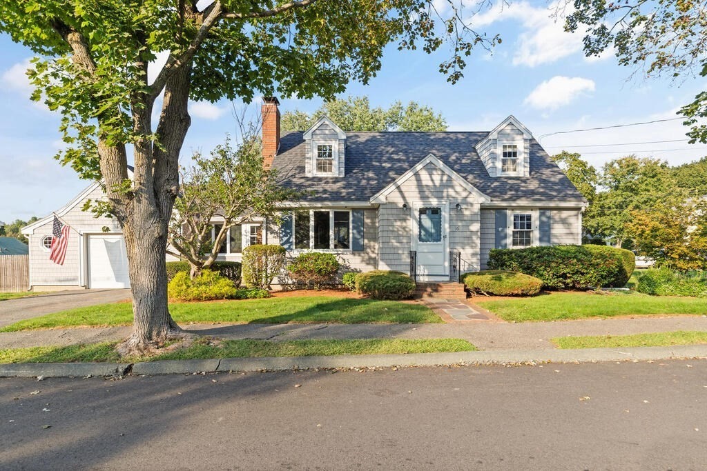 front view of a house with a big yard