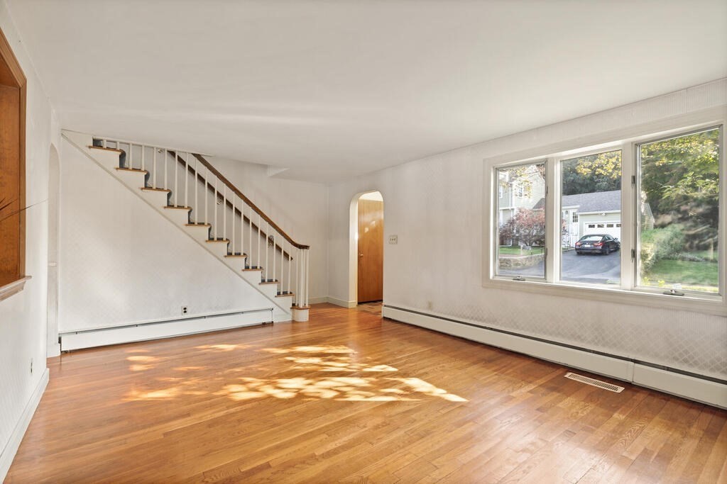 16 Surrey Road Salem, MA 01970 - Photo 11 of 32 a view of an empty room with windows