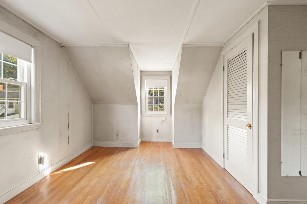 16 Surrey Road Salem, MA 01970 - Photo 28 of 32 a view of a room with wooden floor and windows