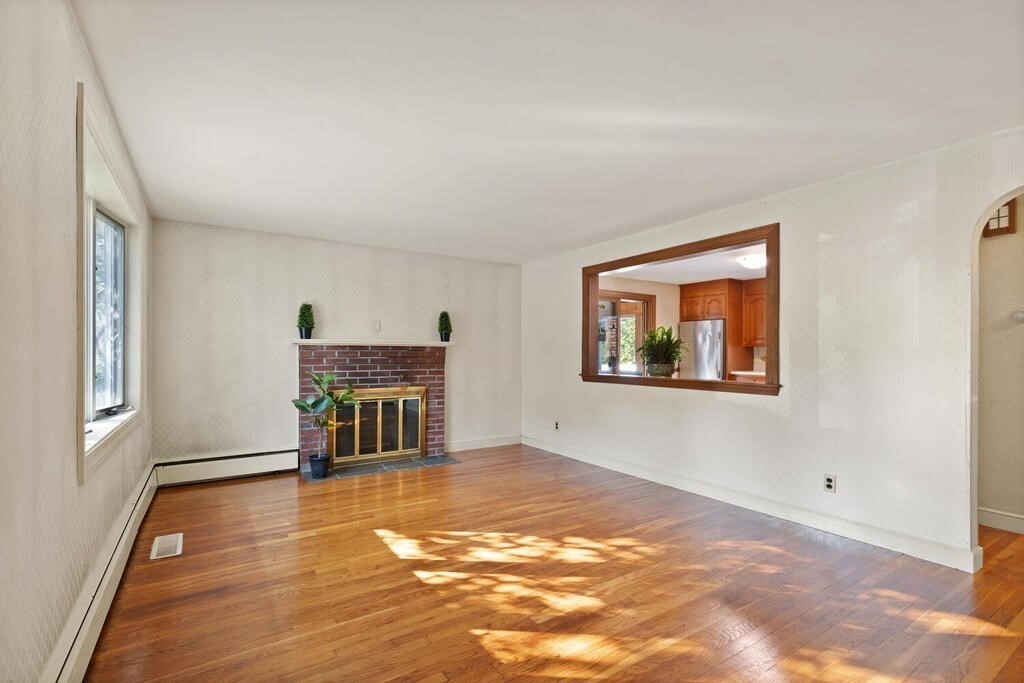 16 Surrey Road Salem, MA 01970 - Photo 7 of 32 a view of livingroom with furniture and workspace