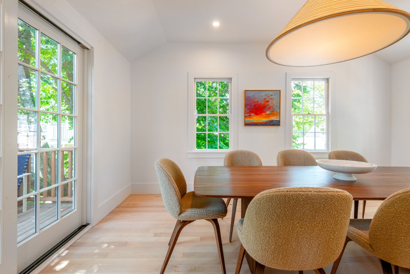 12 Willard Street Nantucket, MA 02554 - Photo 14 of 36 a view of a dining room with furniture wooden floor and a chandelier